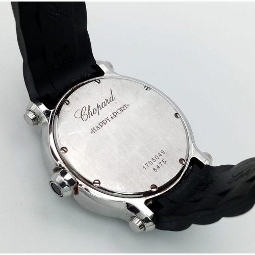 681 - A Chopard Happy Sport Ladies Watch. Black rubber strap with stainless steel case - 36mm. Black dial ... 