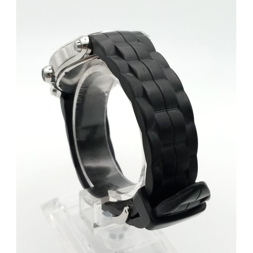 681 - A Chopard Happy Sport Ladies Watch. Black rubber strap with stainless steel case - 36mm. Black dial ... 