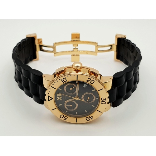 71 - A Chaumet of Paris 645B 18K Yellow Gold Chronograph Gents Watch. Black rubber strap with 18k gold cl... 