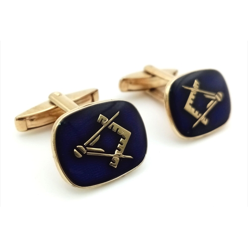 895 - A PAIR OF 9K GOLD AND ENAMEL MASONIC CUFF LINKS.10.6gms