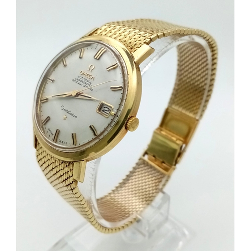 43 - A 1960s 18K Solid Gold Omega Constellation Gents Watch. 18K gold strap and case - 36mm. White dial w... 