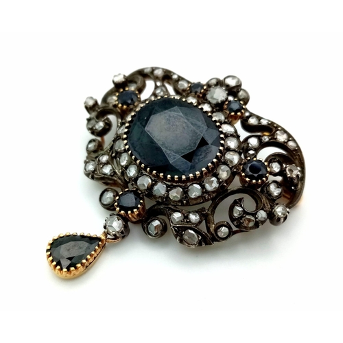 1061 - A VICTORIAN DIAMOND AND BLUE/BLACK STONE BROOCH SET IN GOLD AND SILVER  19.5gms WITH OVER 2CT OF OLD... 