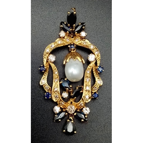 1227 - AN EDWARDIAN 18K GOLD DIAMOND AND SAPPHIRE PENDANT WITH A SOUTH SEA PEARL AT CENTRE.  11.1gms  5cms ... 