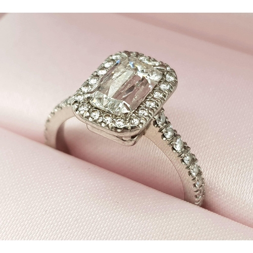 689 - A Boodles Vintage Ashoka-Cut Diamond in Platinum Ring. 1.2ct central diamond with an additional 0.45... 