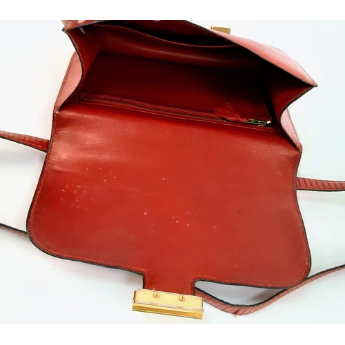 731 - A Vintage Hermes Constance Handbag. Burgundy red crocodile leather. Gilded hardware with letter H cl... 