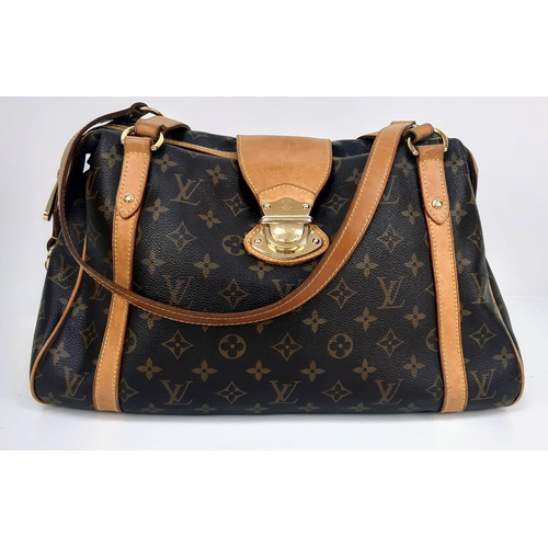 919 - A Louis Vuitton Monogram Canvas Stresa PM Bag. Leather trim with gold-tone hardware. Nylon lined spa... 