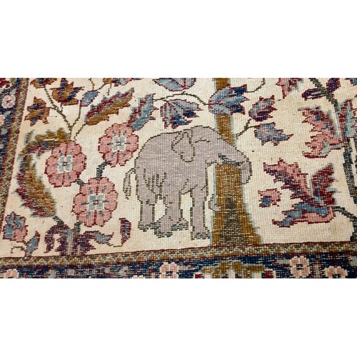 1203 - Three hand woven rugs, one silk and an antique hand woven tapestry/wall hanging. The silk rug is in ... 