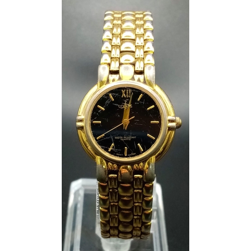 1549 - A group of five watches: 
A gold tone, stainless steel LORUS ladies watch, 25 mm case, quartz moveme... 