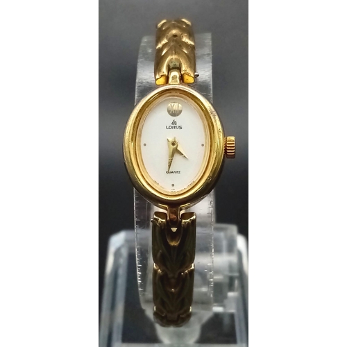 1549 - A group of five watches: 
A gold tone, stainless steel LORUS ladies watch, 25 mm case, quartz moveme... 