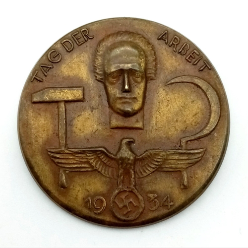 696 - A 3rd Reich 1934 Workers Day Tinnie Badge.