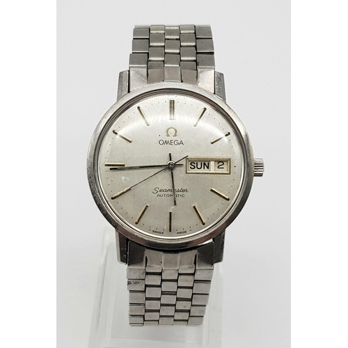 1001 - A Vintage Omega Seamaster Automatic Gents Watch. Stainless steel strap and case - 35mm. Silver tone ... 