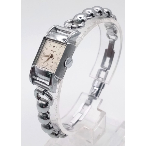 1330 - A SELECTION OF LADIES STAINLESS STEEL WRIST WATCHES: SWATCH IRONY, MIDO QUARTZ AND 2 OTHERS.