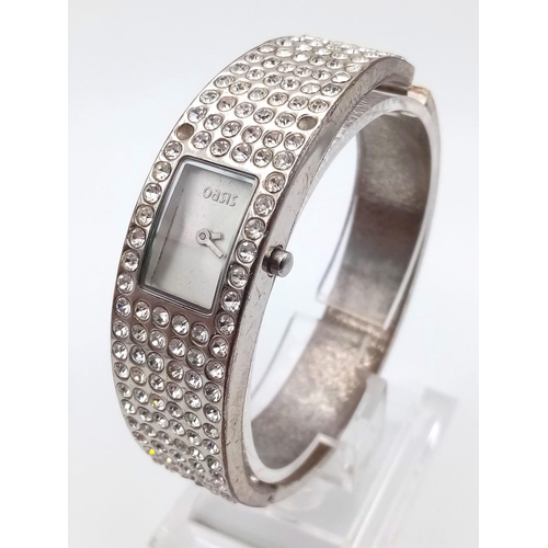 1391 - 2 Ladies wrist watches: Charriol Geneve swiss made watch, and an Oasis bracelet watch.