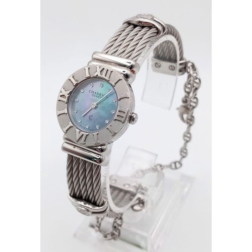 1391 - 2 Ladies wrist watches: Charriol Geneve swiss made watch, and an Oasis bracelet watch.