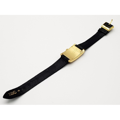 786 - A Baume and Mercier 18K Gold and Diamond Ladies Tank Watch. Black crocodile leather strap. 18k gold ... 