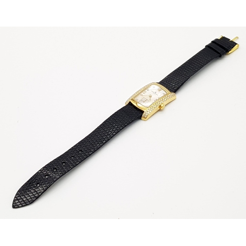 786 - A Baume and Mercier 18K Gold and Diamond Ladies Tank Watch. Black crocodile leather strap. 18k gold ... 