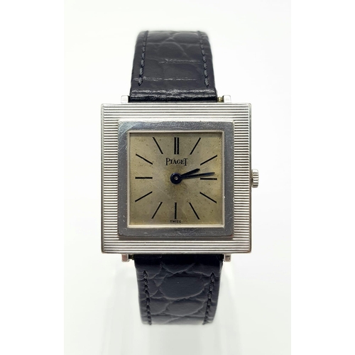 916 - A Vintage 18K White Gold Piaget Ladies Watch. Black leather strap with gold clasp. Gold case - 26 x ... 