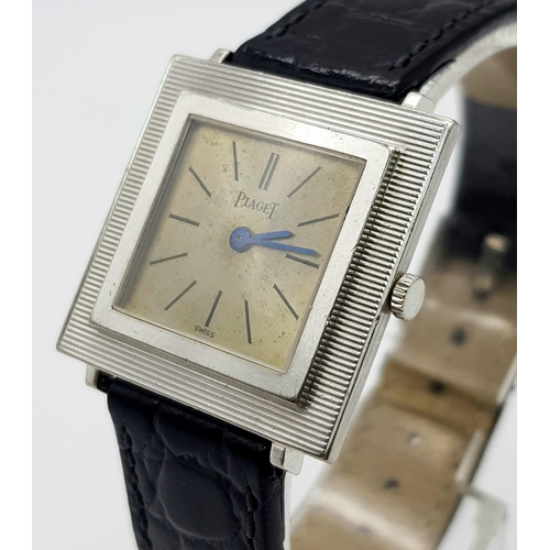 916 - A Vintage 18K White Gold Piaget Ladies Watch. Black leather strap with gold clasp. Gold case - 26 x ... 