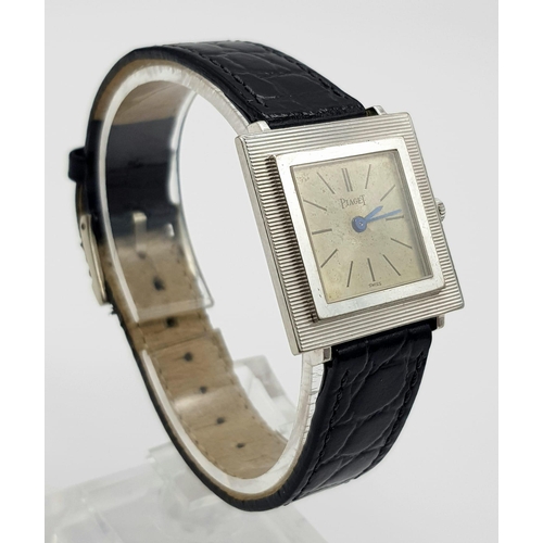 916 - A Vintage 18K White Gold Piaget Ladies Watch. Black leather strap with gold clasp. Gold case - 26 x ... 