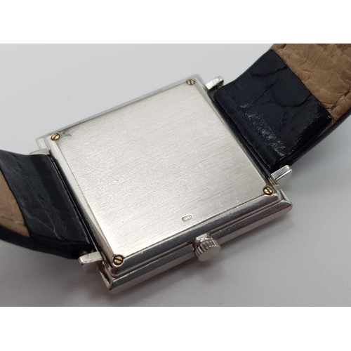 916 - A Vintage 18K White Gold Piaget Ladies Watch. Black leather strap with gold clasp. Gold case - 26 x ... 