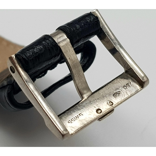 916 - A Vintage 18K White Gold Piaget Ladies Watch. Black leather strap with gold clasp. Gold case - 26 x ... 