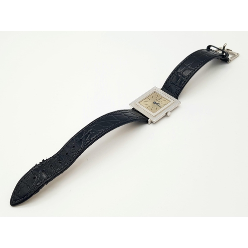 916 - A Vintage 18K White Gold Piaget Ladies Watch. Black leather strap with gold clasp. Gold case - 26 x ... 