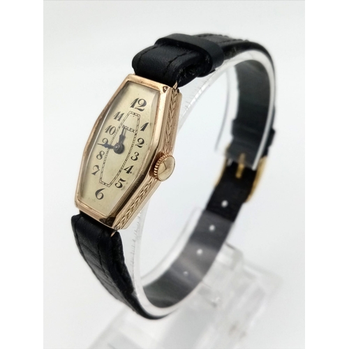 1359 - A Vintage Rolex 18k Gold Cased Ladies Watch. Black leather strap. Gold case - 16 x 27mm. Mechanical ... 