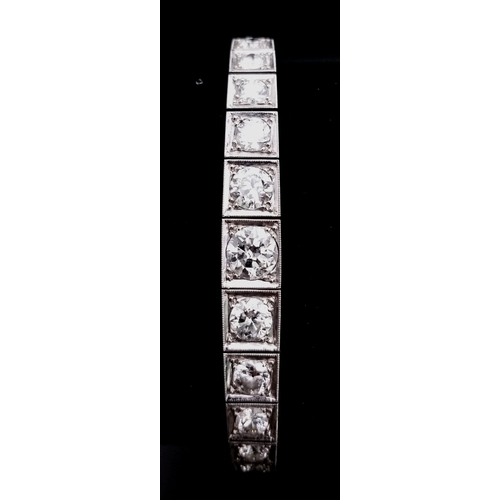 15 - A Time-Stopping Graduated 6ct (approx) Diamond and Platinum Ladies Bracelet. 32 brilliant round cut ... 