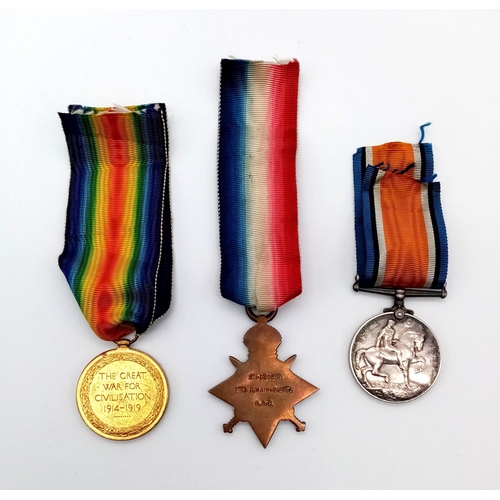 201 - A WW1 British Medal Trio in a Princess Mary Christmas Gift Tin. Awarded to: M2-020585 Pte R.Wainwrig... 