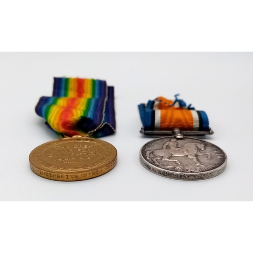 201 - A WW1 British Medal Trio in a Princess Mary Christmas Gift Tin. Awarded to: M2-020585 Pte R.Wainwrig... 