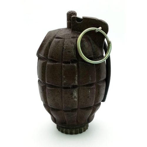 208 - An INERT WW2 No 36 Mills Hand Grenade. Dated 1943. Great condition for its age.