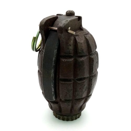 208 - An INERT WW2 No 36 Mills Hand Grenade. Dated 1943. Great condition for its age.