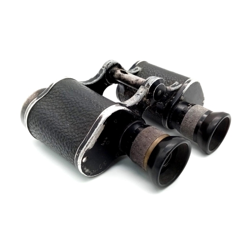 601 - A WW2 German Army 6 x 30 Binoculars. Marked 'Dienstglas' meaning service glass. Maker Code Marked be... 