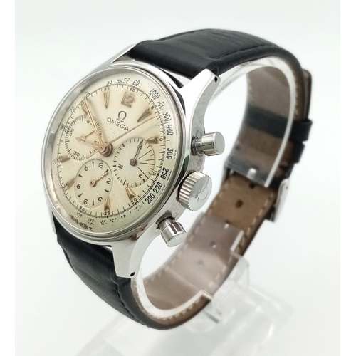 802 - A Vintage Omega Chronograph Gents Watch. Black leather strap. Stainless steel case - 36mm. Light gol... 