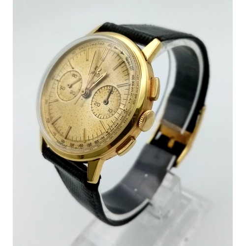 823 - A Vintage Omega 18k Gold Chronograph Gents Watch. Black leather strap. Gold case - 36mm. Gold tone d... 