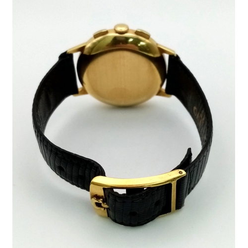 823 - A Vintage Omega 18k Gold Chronograph Gents Watch. Black leather strap. Gold case - 36mm. Gold tone d... 