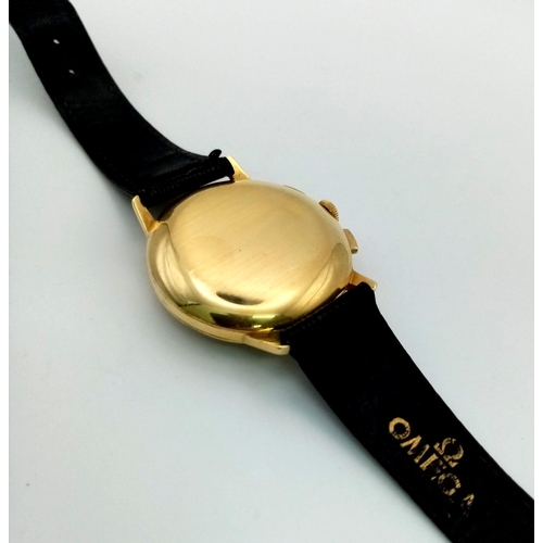 823 - A Vintage Omega 18k Gold Chronograph Gents Watch. Black leather strap. Gold case - 36mm. Gold tone d... 