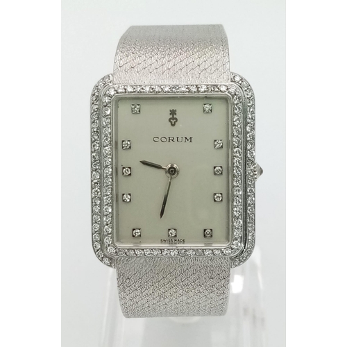 829 - A Corum 18k White Gold and Diamond Ladies Dress Watch. Solid gold strap and case - 27 x 30mm. Diamon... 