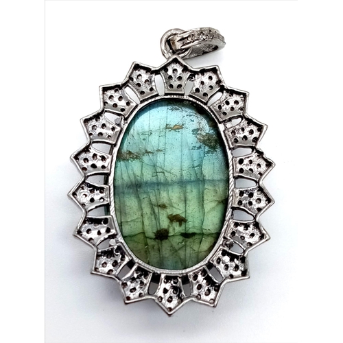 843 - Antique Labradorite Pendant with Rose cut diamonds. 925 Sterling silver. 5cm
Labrodite 32Cts,
Diamon... 