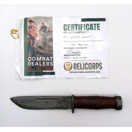 943 - A Certified Genuine Movie Prop Resin U.S.M.C Knife. Used in the film “Pacific”.