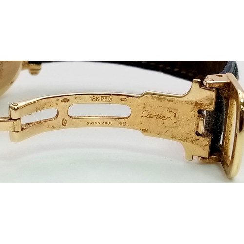 1507 - A Cartier 18K Gold and Diamond Ladies Watch. Leather strap with Cartier gold clasp. 18k gold and dia... 