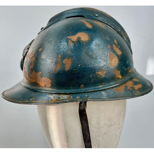 349 - A WW1 French 1915 Mle Casque Adriane Helmet. Badged to the Infantry. Original Paint & Liner.