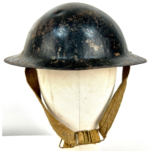 608 - A WW2 British National Fire Service Helmet. Numbered 34 for Ealing London. Complete with liner and c... 