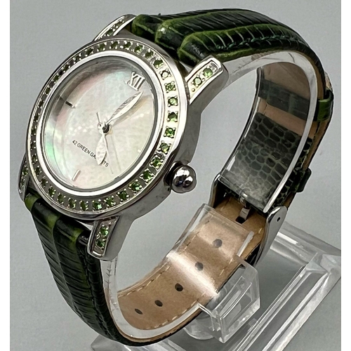 1013 - A Ladies Gem Set Quartz Stainless Steel Watch Set with 42 Green Garnets in the Bezel and Shoulders, ... 