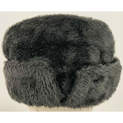 1213 - A Hudson British made black fur hat.