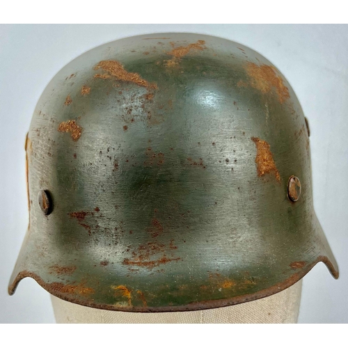 131 - A WW2 German M35 Police Helmet Small Size 60. Maker: N.S. Vereinigte Deutsche Nickelwerke AG, Schwer... 