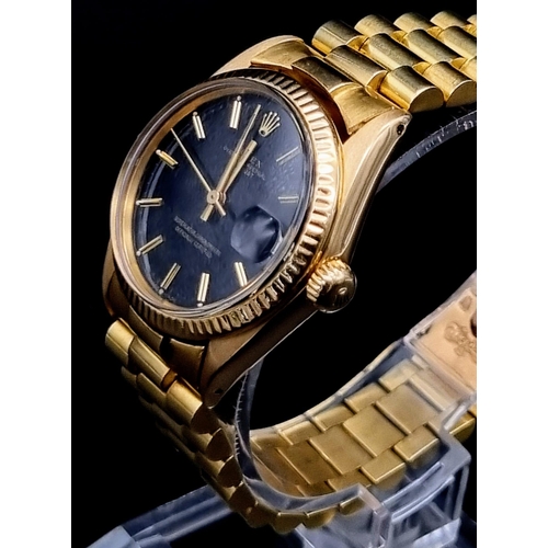 102 - An 18K Solid Gold Rolex Perpetual Datejust Ladies Watch. Gold strap and case - 31mm. Black dial. Aut... 