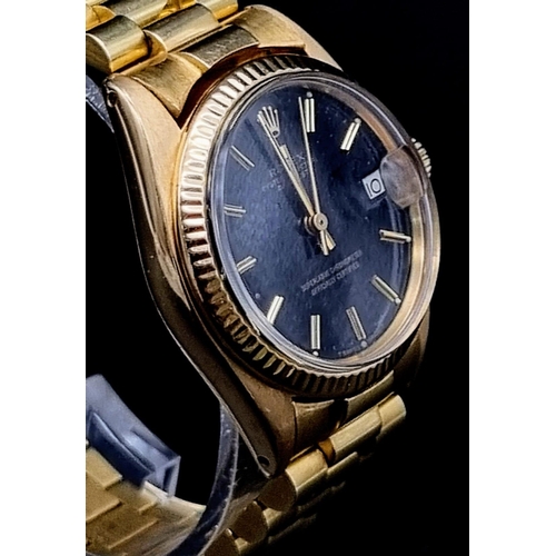 102 - An 18K Solid Gold Rolex Perpetual Datejust Ladies Watch. Gold strap and case - 31mm. Black dial. Aut... 