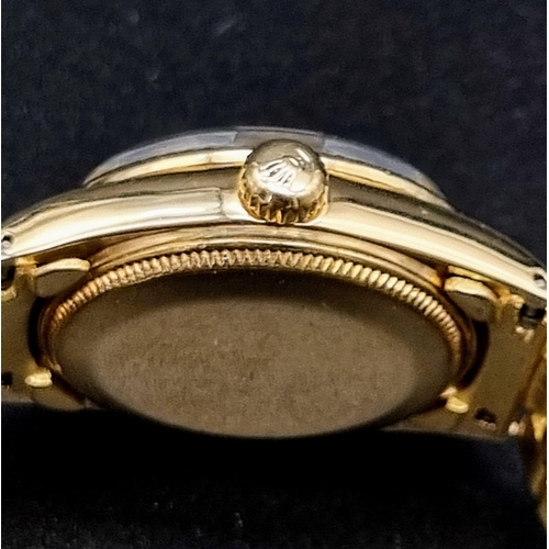 102 - An 18K Solid Gold Rolex Perpetual Datejust Ladies Watch. Gold strap and case - 31mm. Black dial. Aut... 