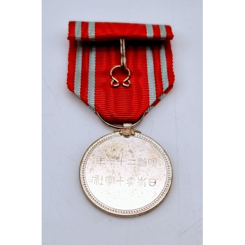 1333 - A JAPANESE WORLD WAR II RED CROSS ORDER MEDAL WITH ORIGINAL RIBBON.